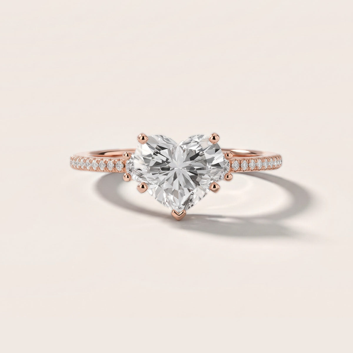 Nerissa Three-Stone Micropavé Heart Diamond Engagement Ring in Rose Gold - front.jpg