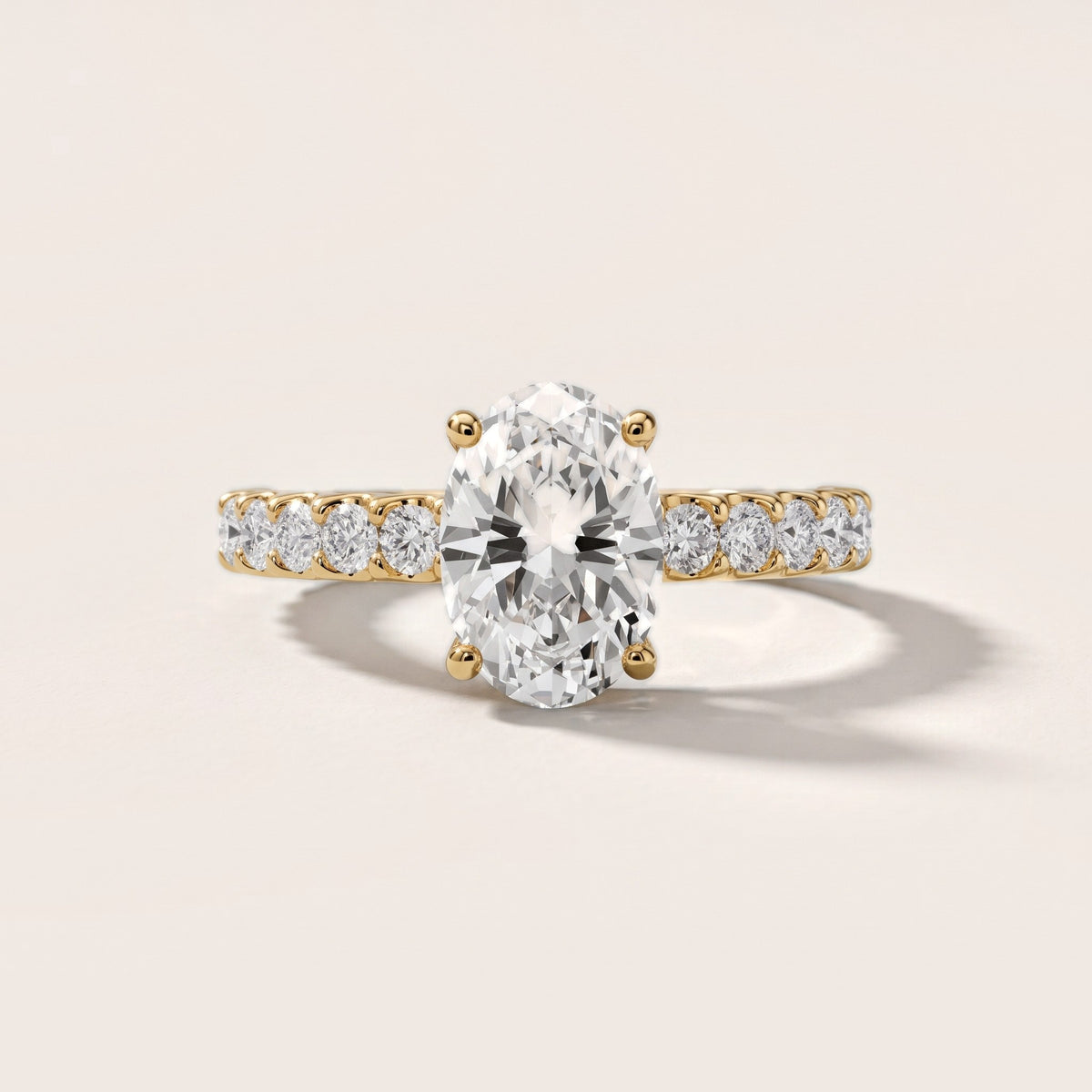 Lynn Statement Pavé Oval Diamond Engagement Ring in Yellow Gold - front.jpg