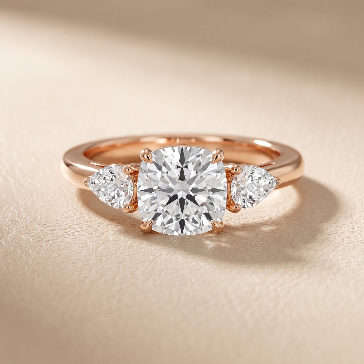 Phoebe Three-Stone Cushion Diamond Ring in Rose Gold - front.jpg