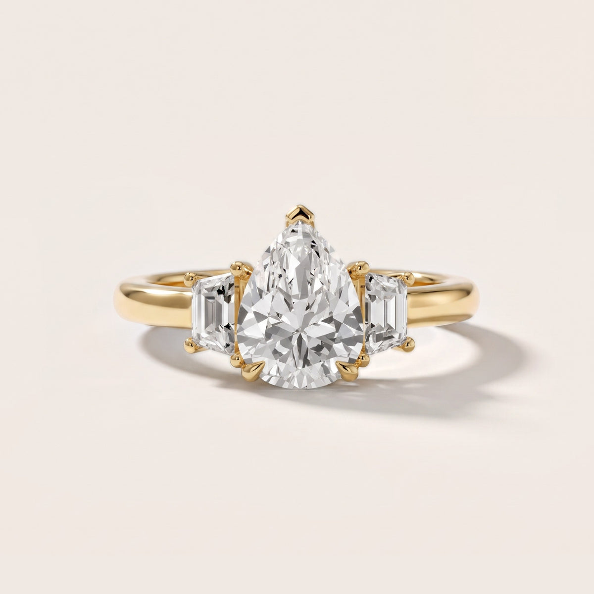 Federica Trapezoid Three-Stone Pear Diamond Engagement Ring in Yellow Gold - front.jpg