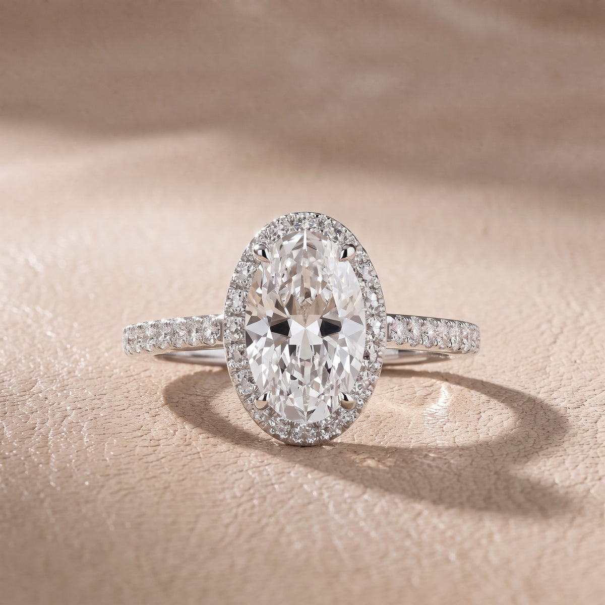 Alma Halo Pavé Oval Diamond Engagement Ring in White Gold - front.jpg