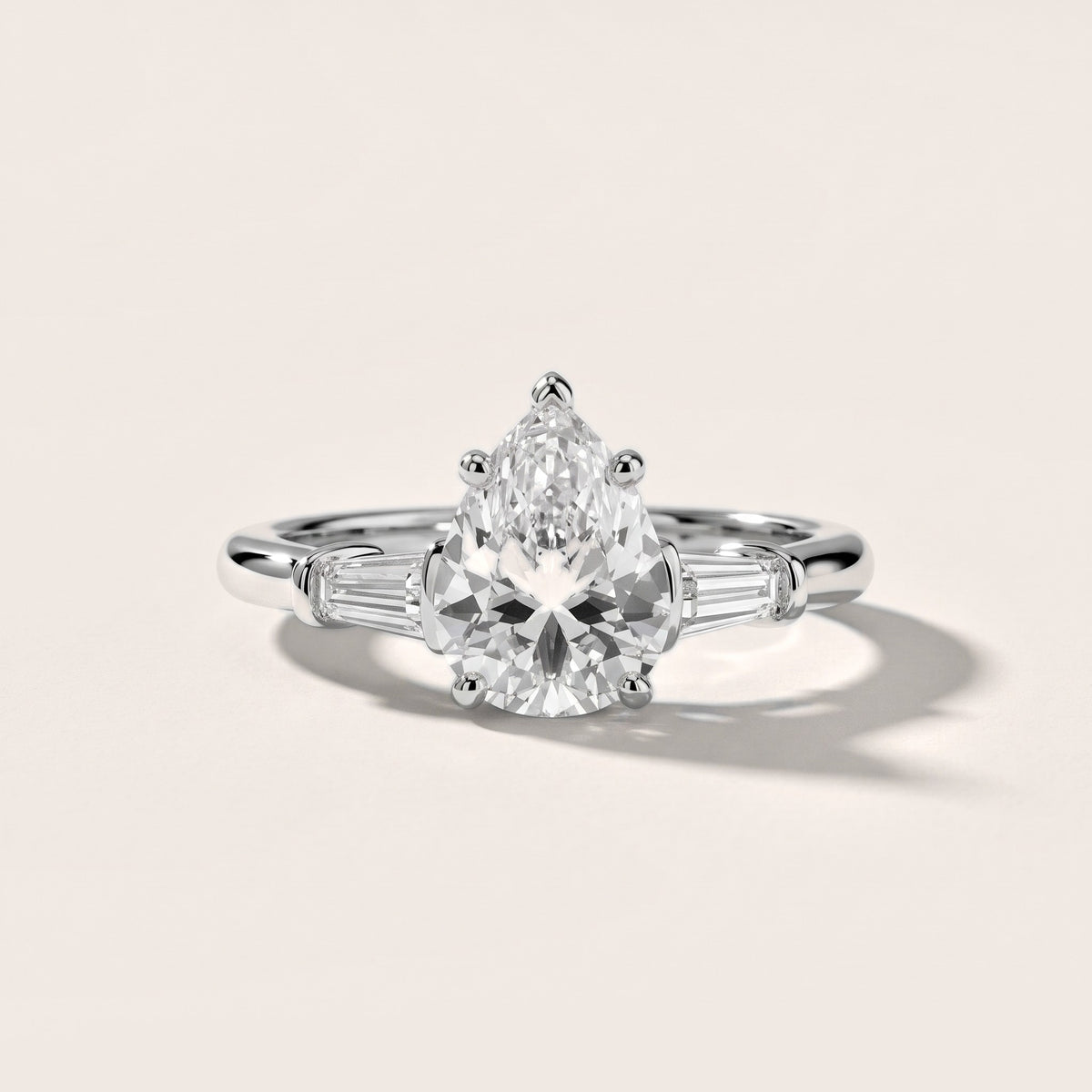 Abby Baguette Three-Stone Pear Diamond Engagement Ring in Silver - front.jpg