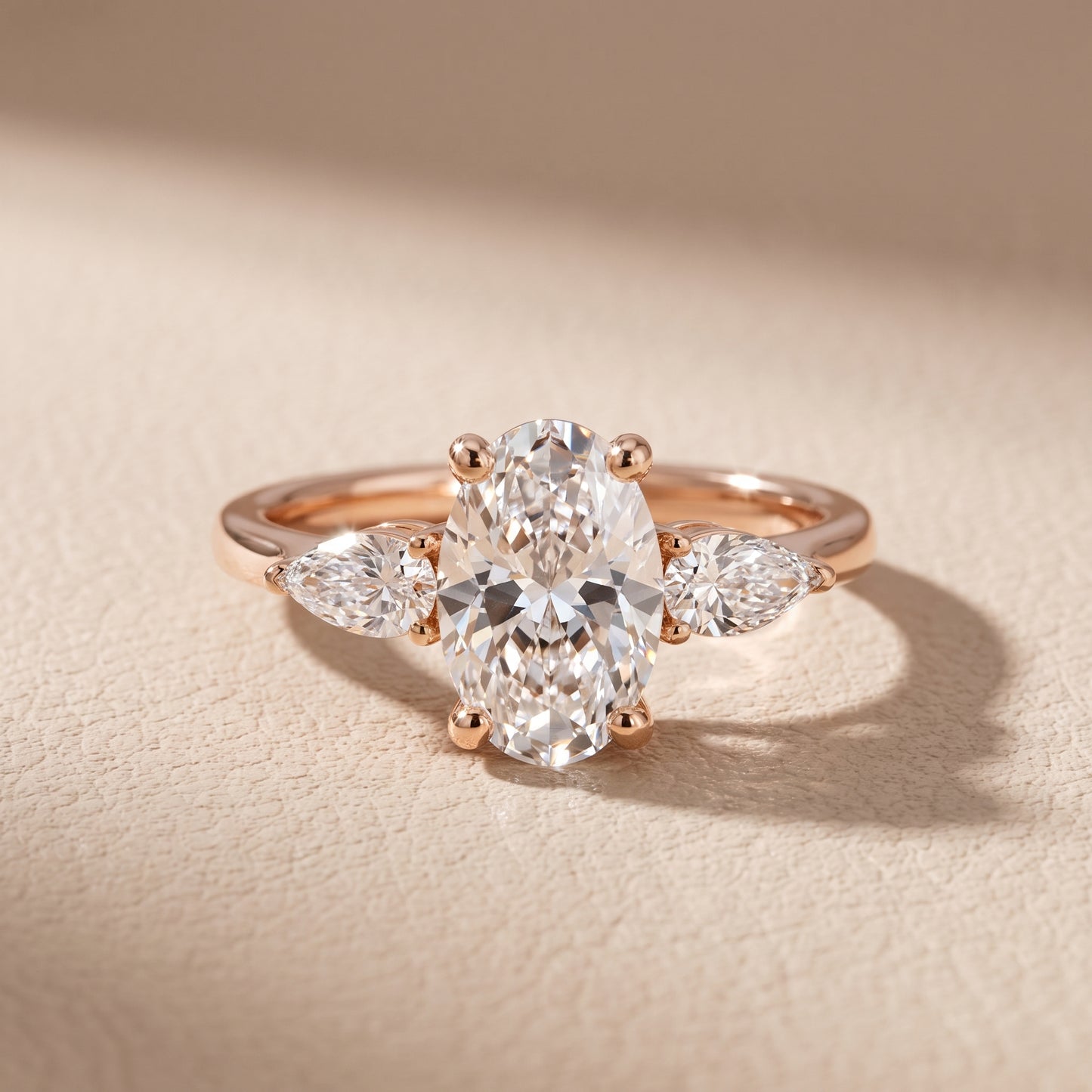 Faye Three-Stone Trellis Oval Diamond Ring in Rose Gold - front.jpg