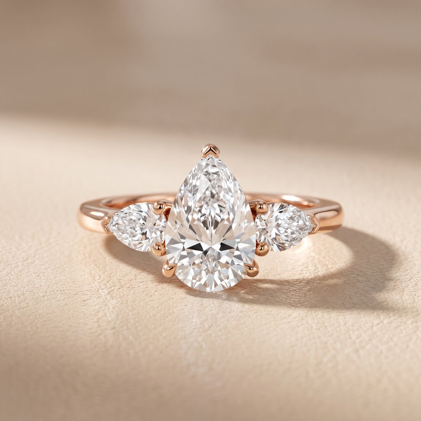 Mirabel Three-Stone Pear Diamond Engagement Ring in Rose Gold - front.jpg