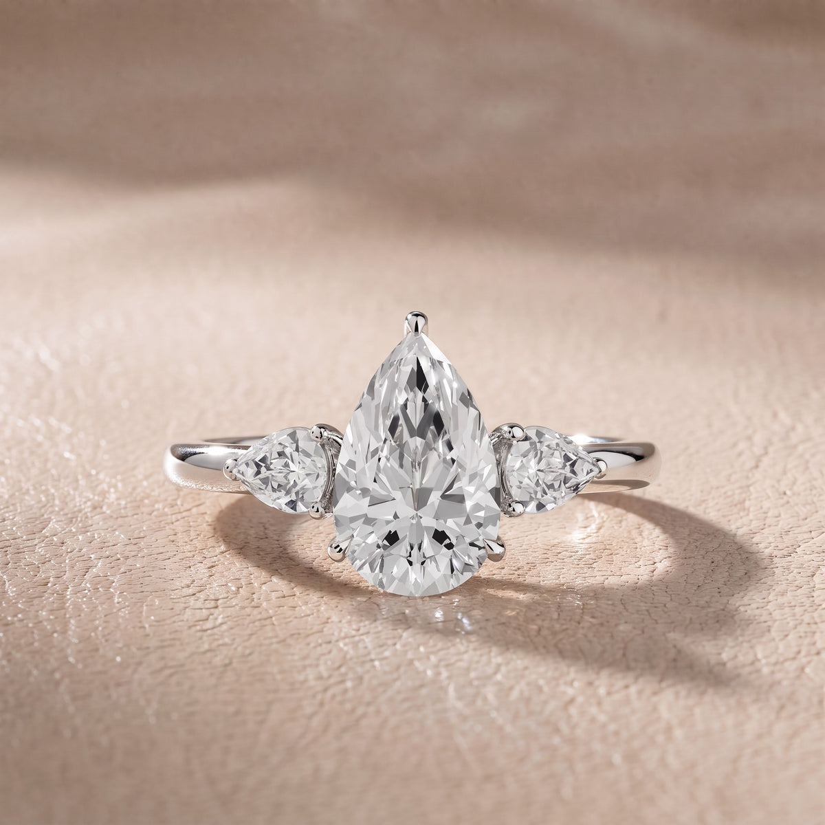 Stella Three-Stone Pear Diamond Engagement Ring in Silver - front.jpg