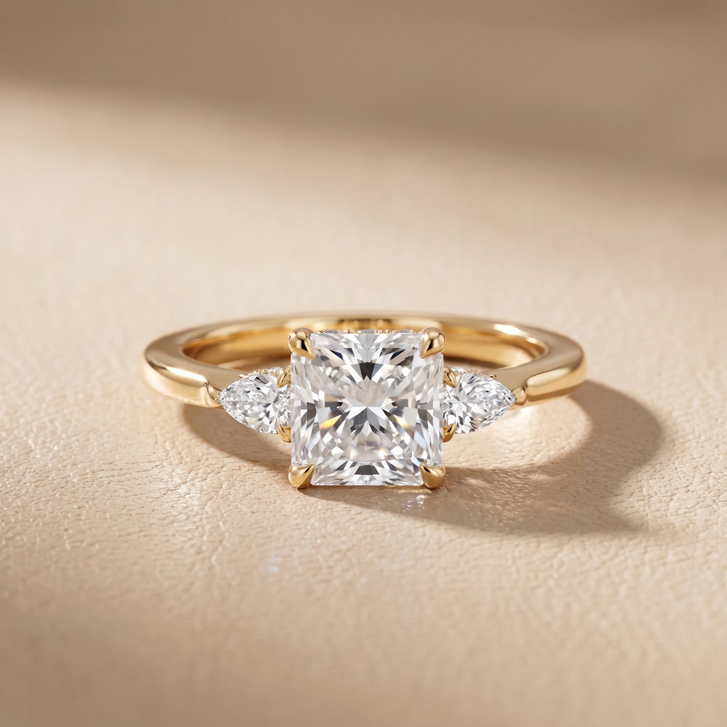 Leila Three-Stone Radiant Diamond Engagement Ring in Yellow Gold - front.jpg