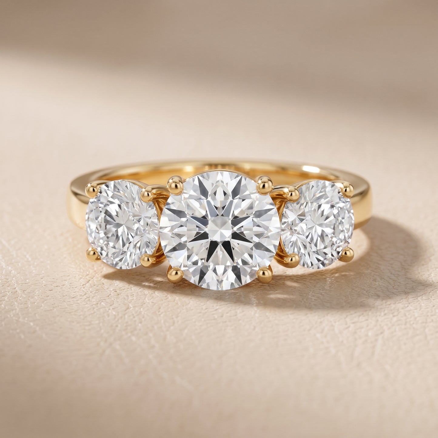 Esme Three-Stone Tapered Round Diamond Ring in Yellow Gold - front.jpg