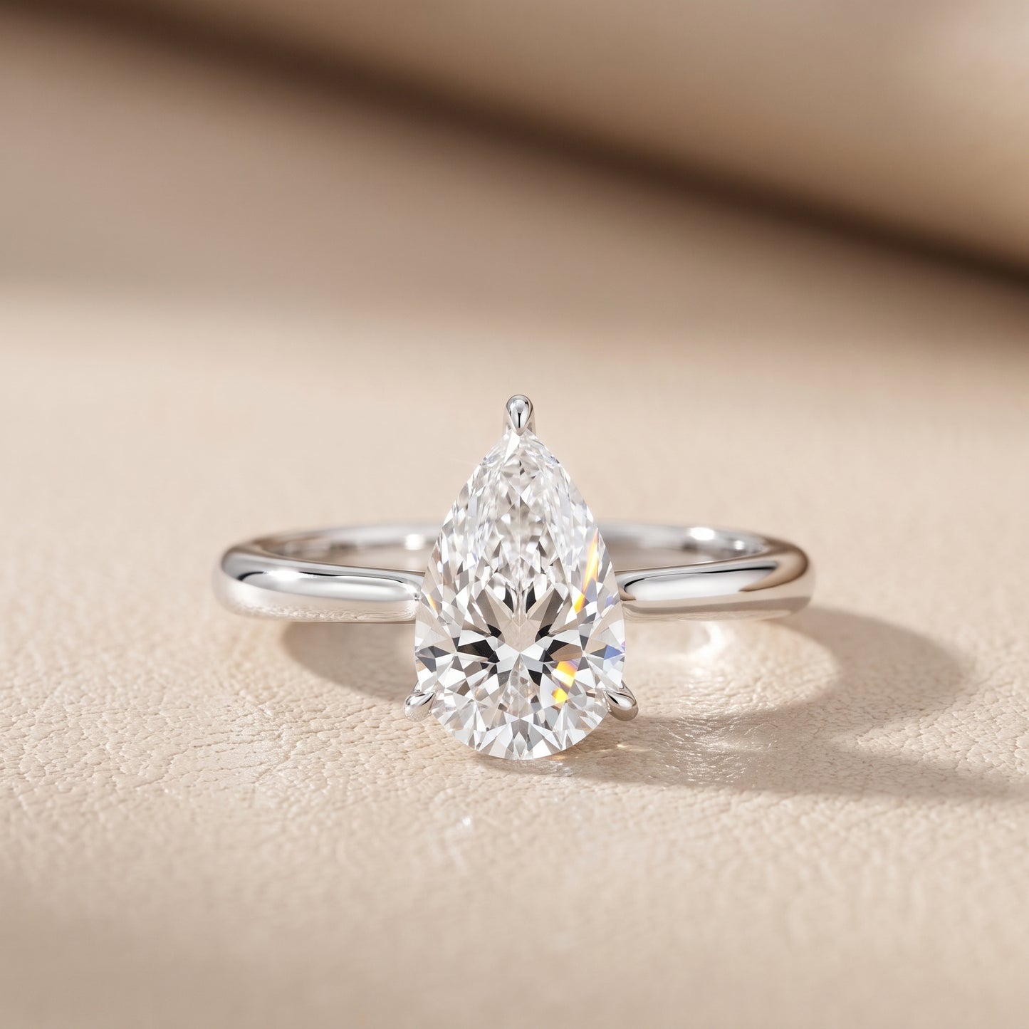 Evie Solitaire Six-Prong Pear Diamond Engagement Ring in Silver - front.jpg