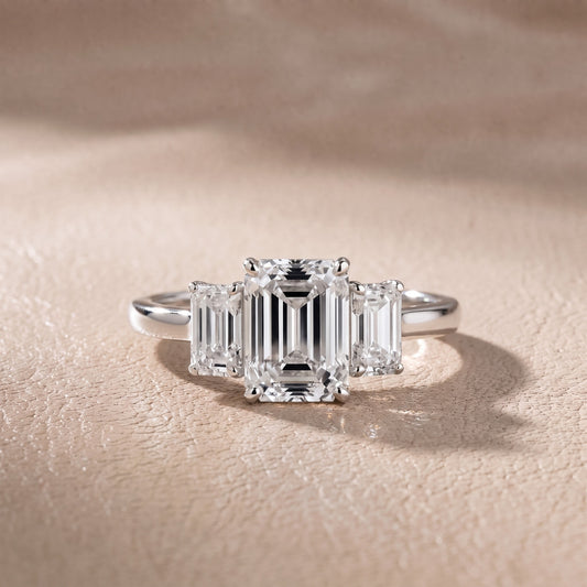 Marian Three-Stone Hidden Halo Emerald Diamond Engagement Ring in White Gold - front.jpg