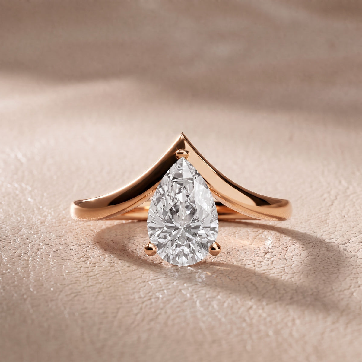 Evelyn Chevron Solitaire Pear Diamond Engagement Ring in Rose Gold - front.jpg