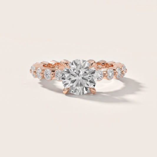 Piper Sidestone Round Diamond Engagement Ring in Rose Gold
