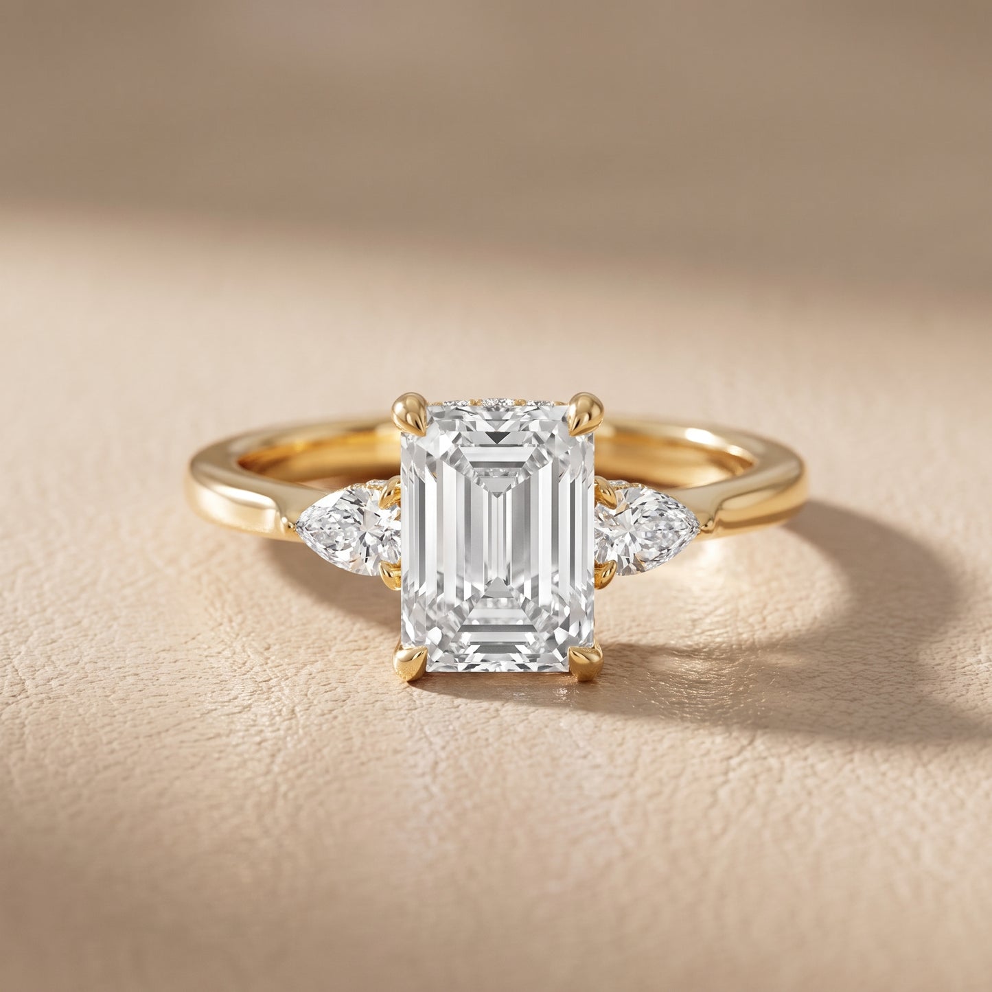 Leila Three-Stone Emerald Diamond Engagement Ring in Yellow Gold - front.jpg