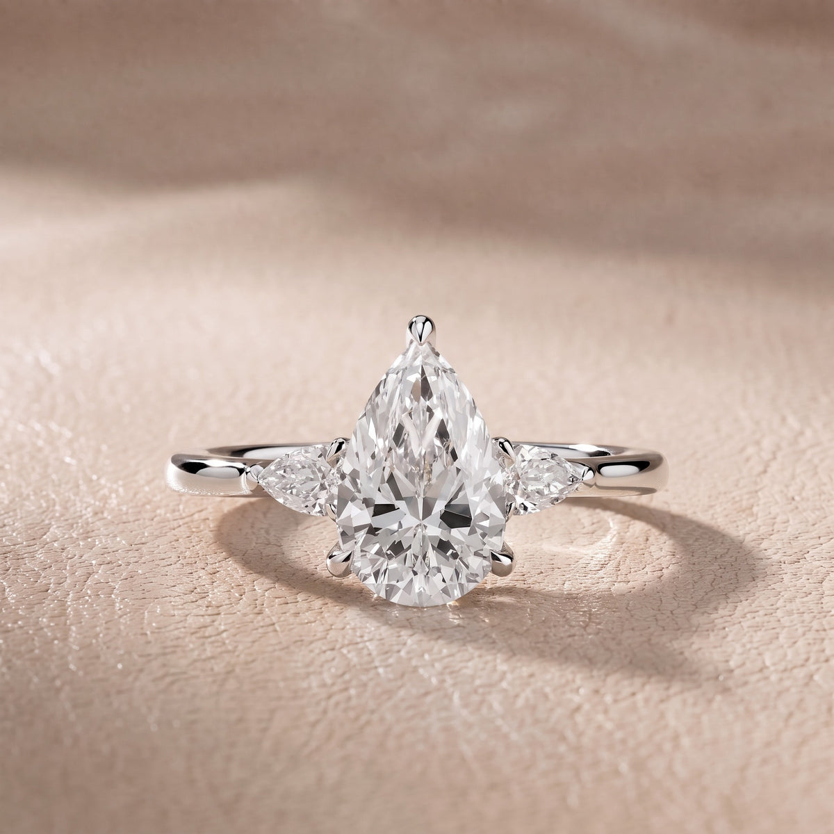 Leila Three-Stone Pear Diamond Engagement Ring in Silver - front.jpg