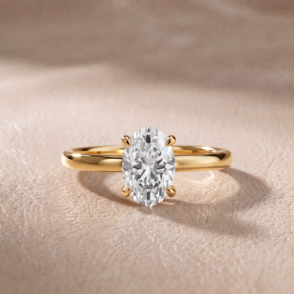 Charlotte Charm Solitaire Oval Diamond Engagement Ring in Yellow Gold