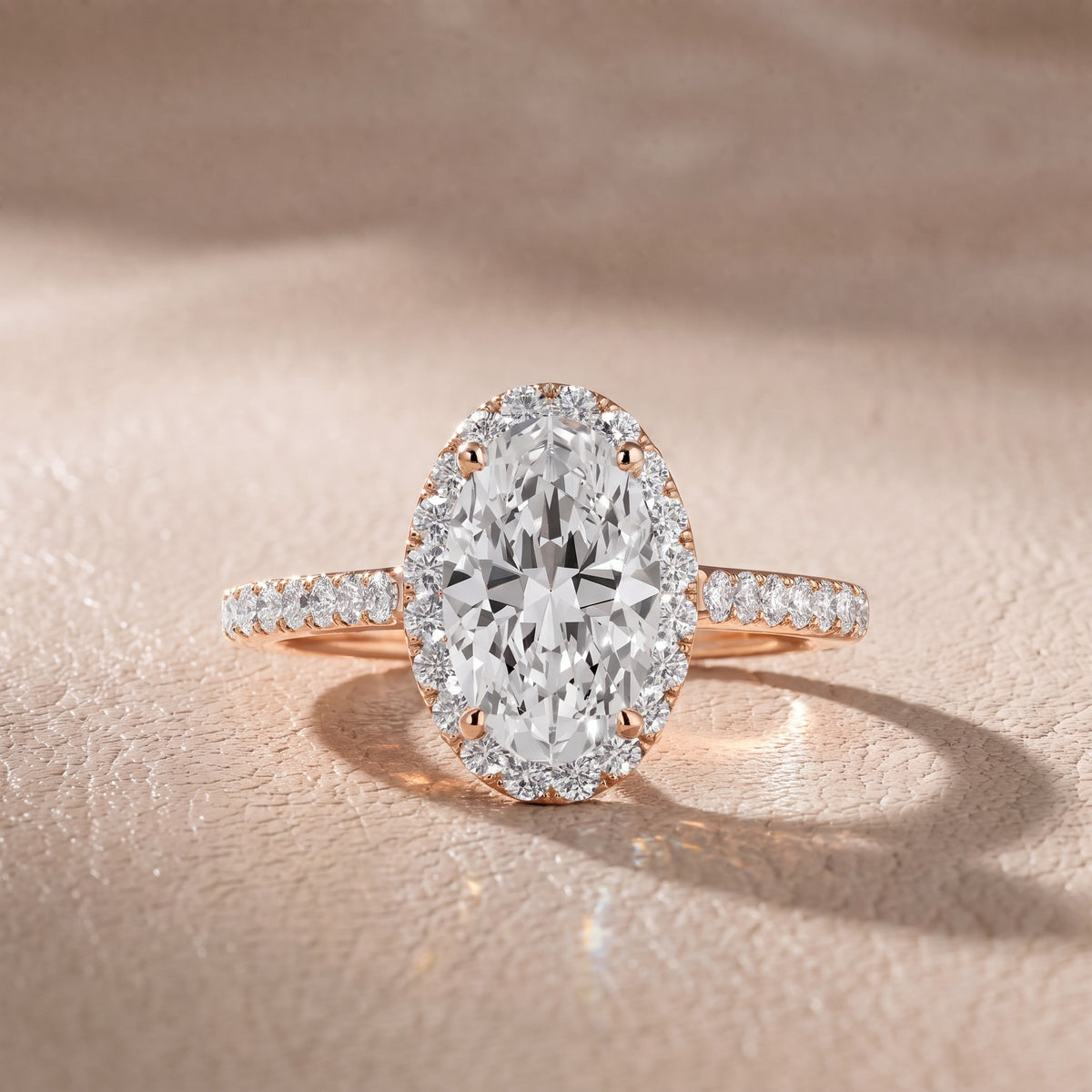 Alma Halo Pavé Oval Diamond Engagement Ring in Rose Gold - front.jpg