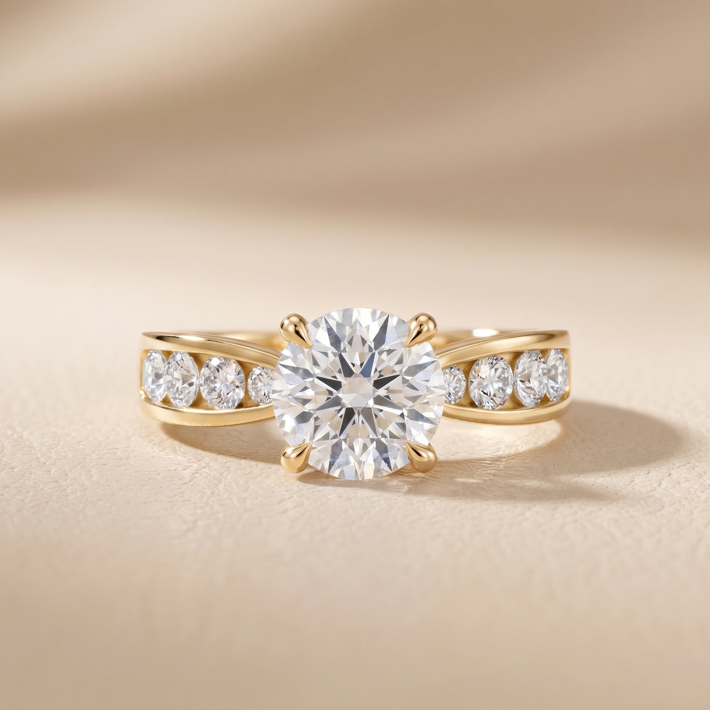 Noor Channel Set Sidestone Round Diamond Engagement Ring in Yellow Gold - front.jpg