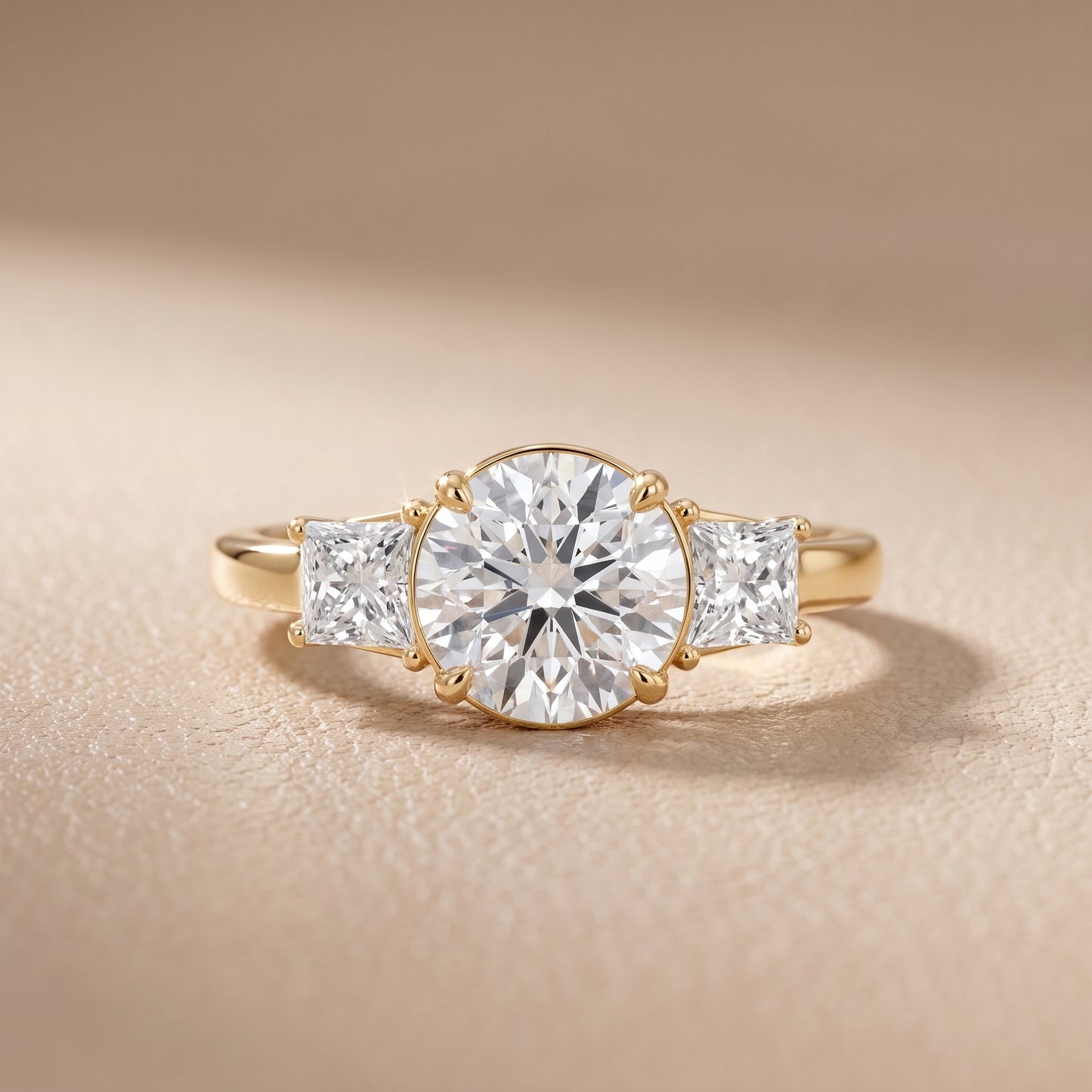 Selena Three-Stone Basket Round Diamond Ring in Yellow Gold - front.jpg