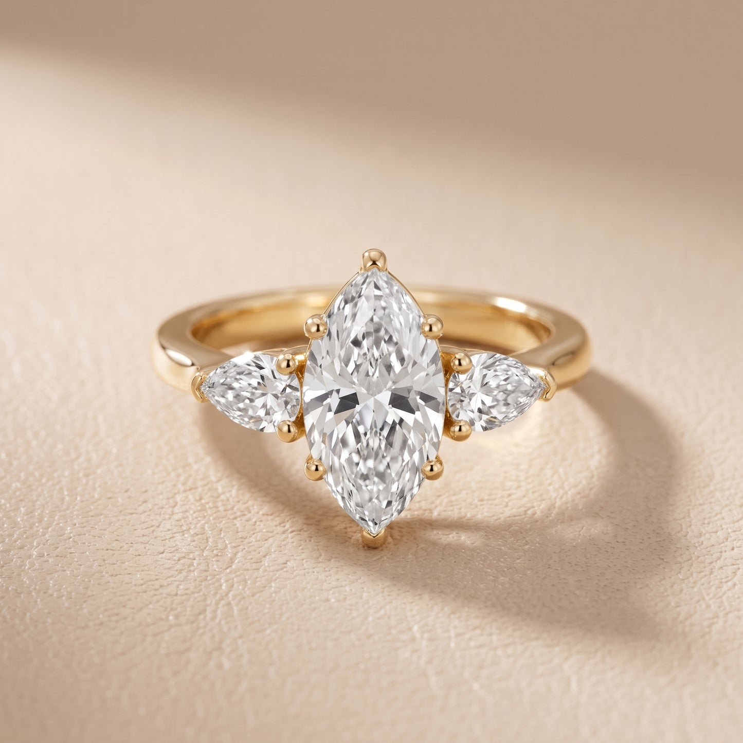 Mirabel Three-Stone Marquise Diamond Engagement Ring in Yellow Gold - front.jpg