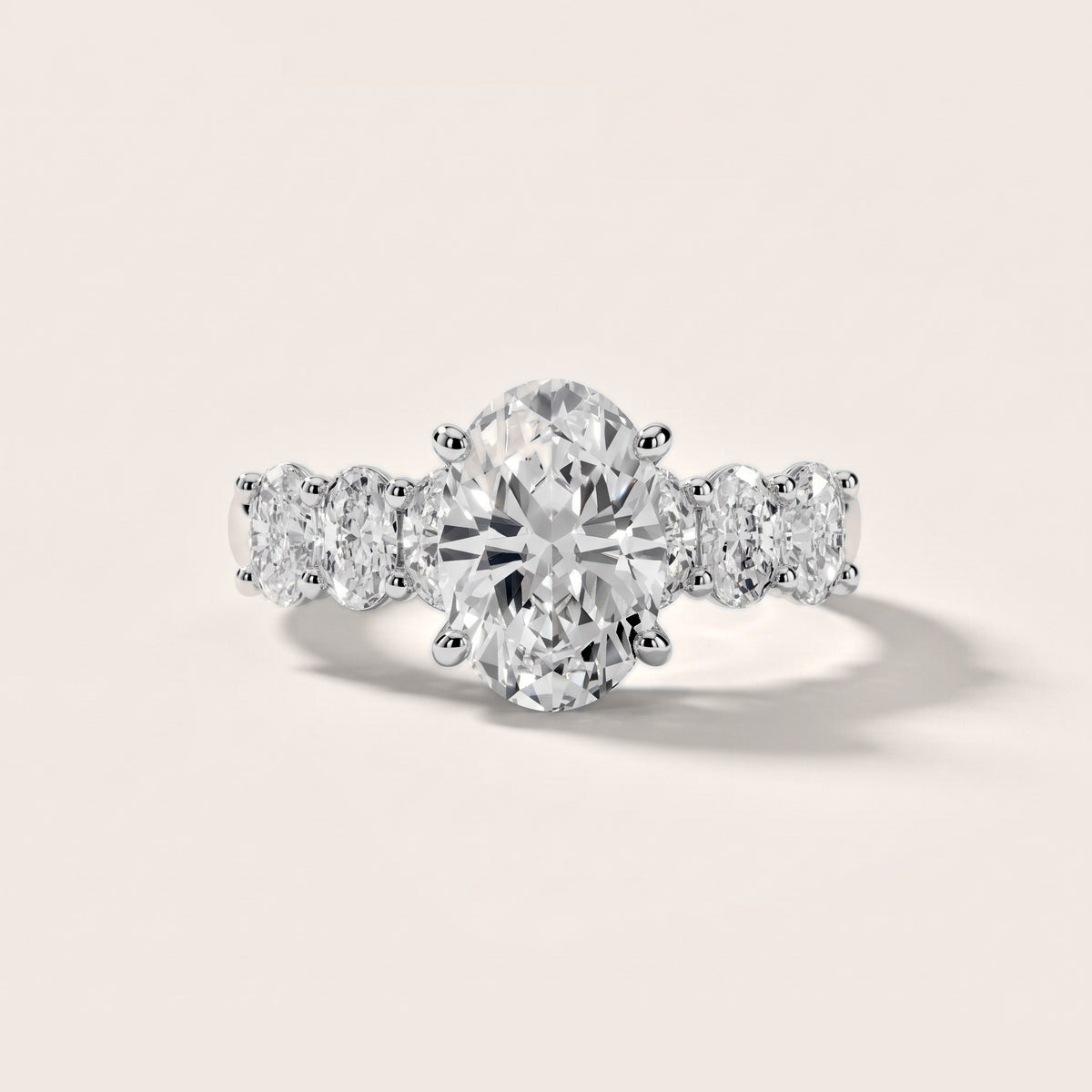 Maple Graduated Seven-Stone Oval Diamond Engagement Ring in Platinum - front.jpg