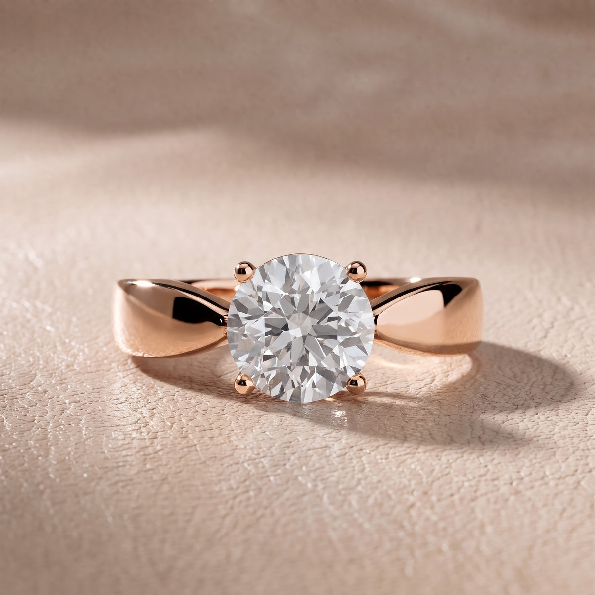 Talia Solitaire Twist Round Diamond Engagement Ring in Rose Gold - front.jpg