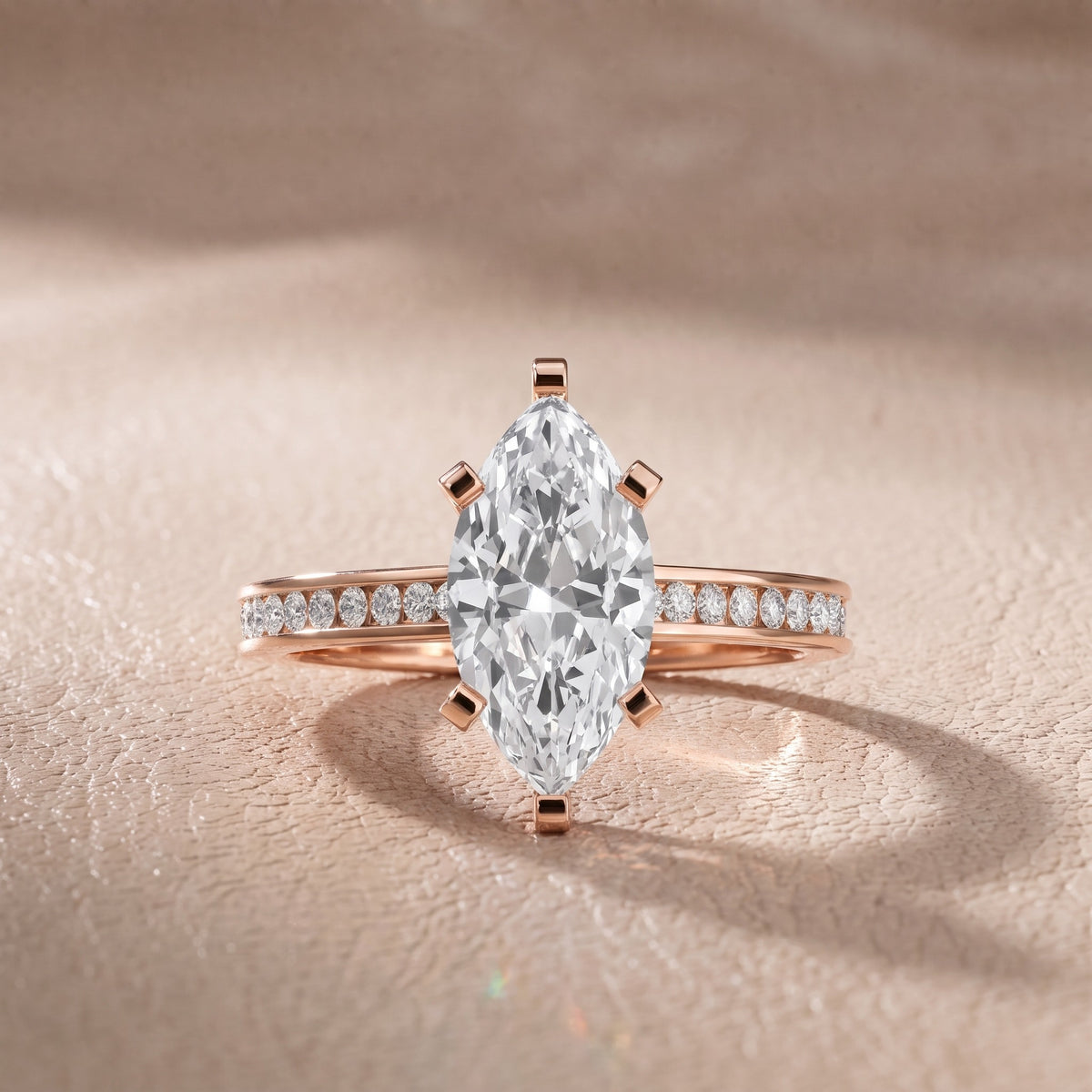 Tessa Solitaire Channel Set Marquise Diamond Engagement Ring in Rose Gold - front.jpg