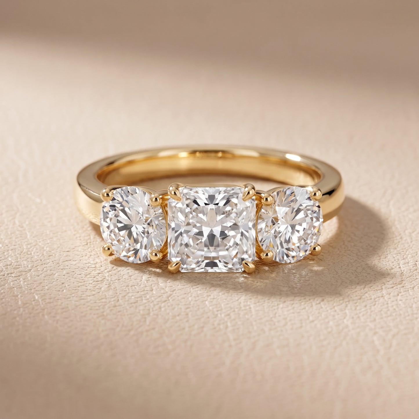 Esme Three-Stone Tapered Radiant Diamond Ring in Yellow Gold - front.jpg