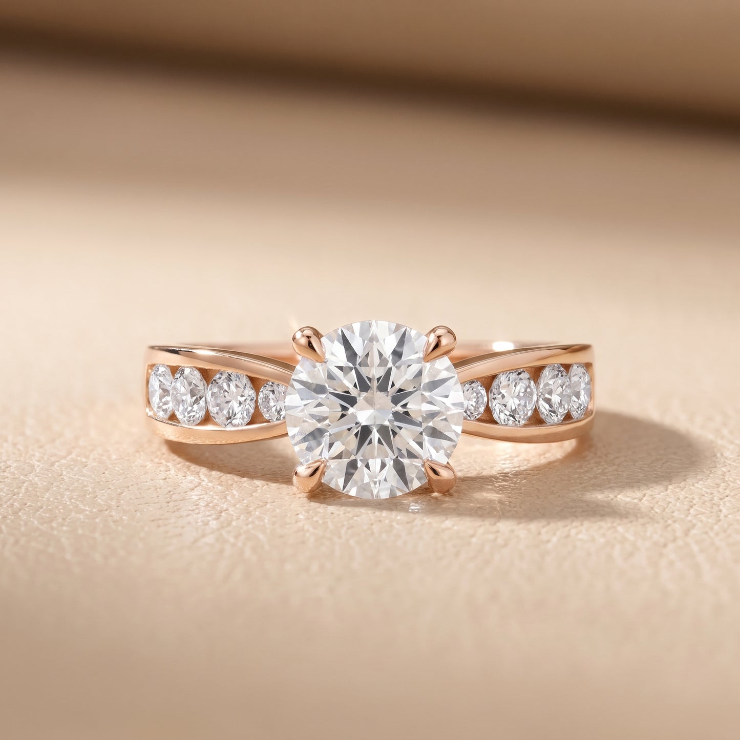 Noor Channel Set Sidestone Round Diamond Engagement Ring in Rose Gold - front.jpg