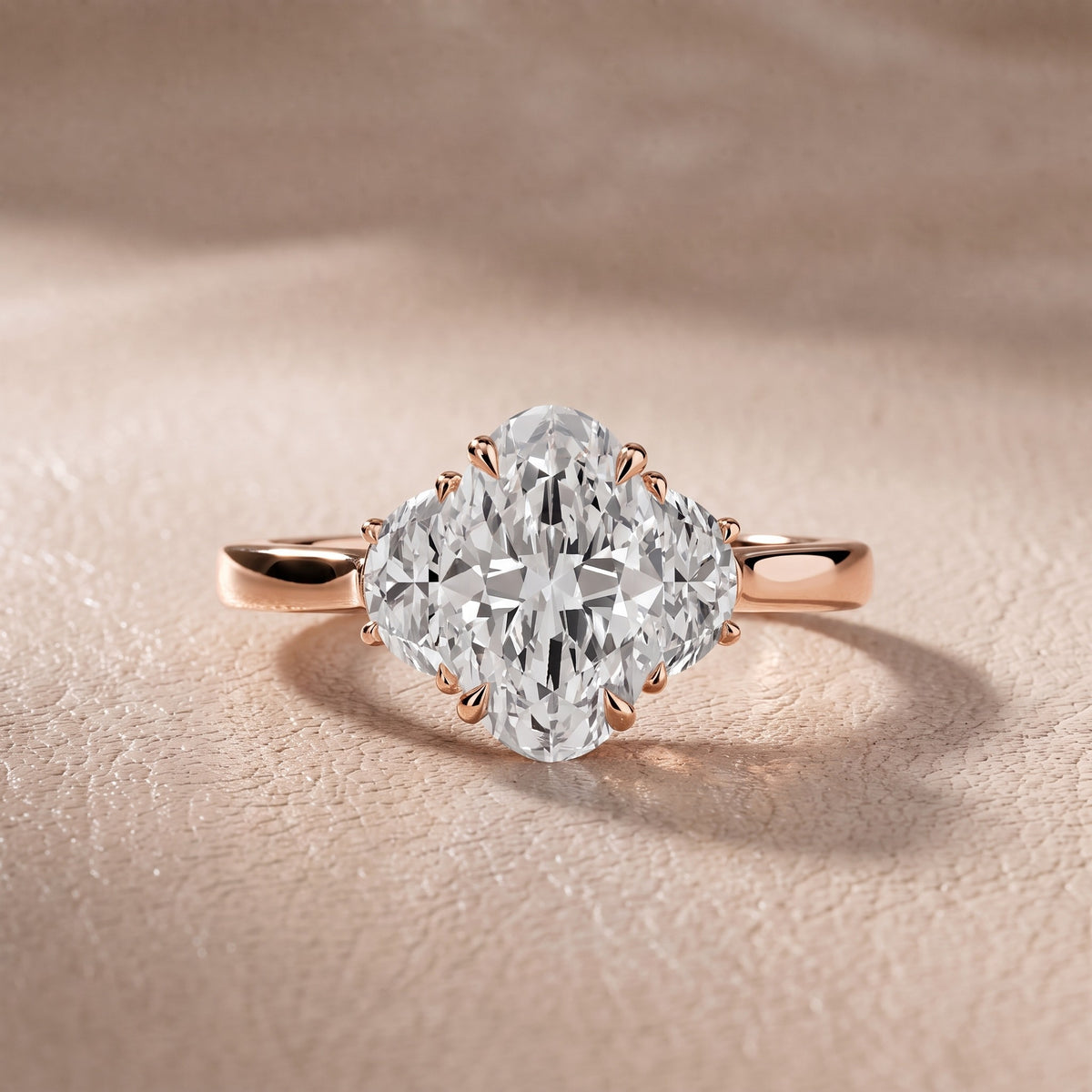 Romy Three-Stone Oval Diamond Engagement Ring in Rose Gold - front.jpg