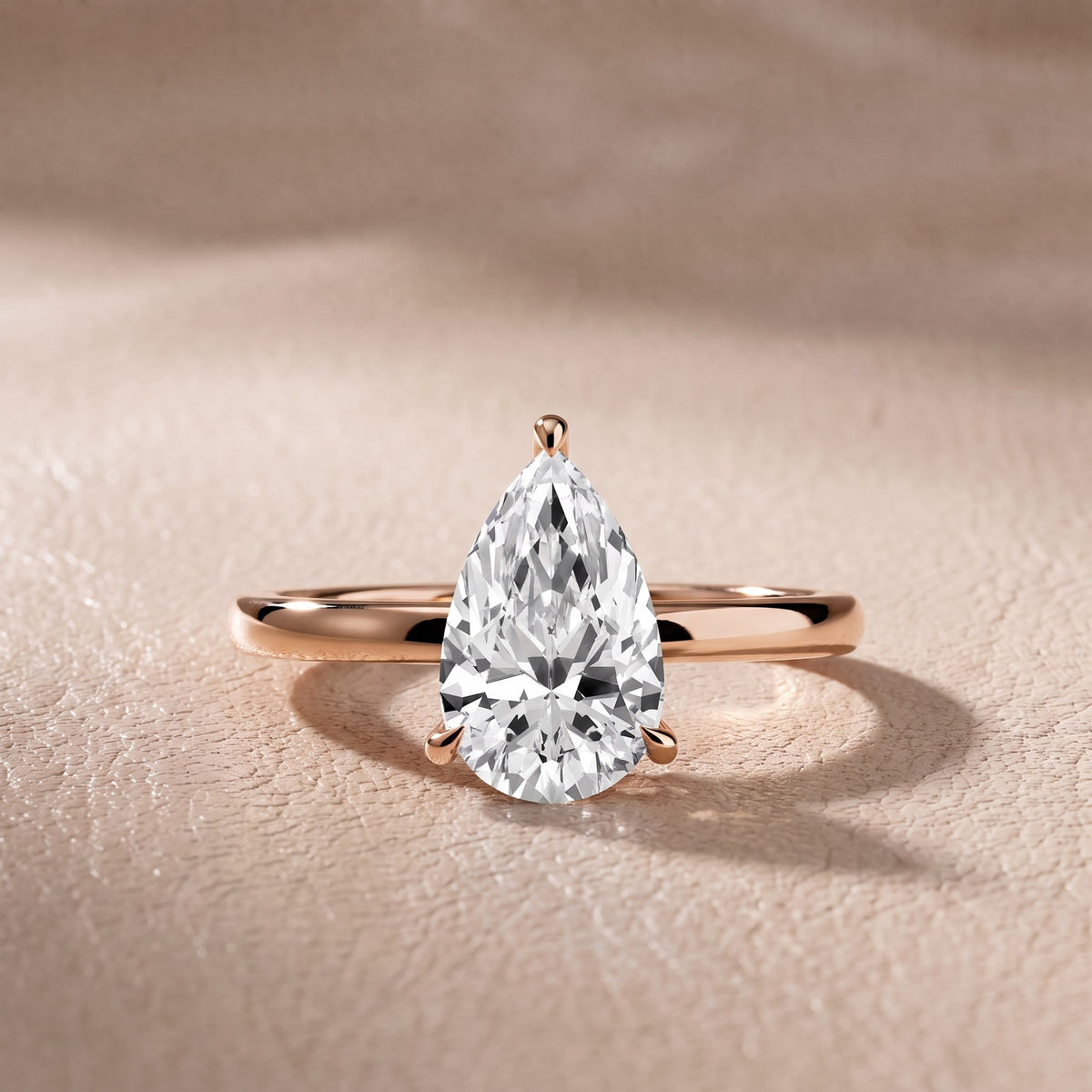 Nadia Petite Solitaire Pear Diamond Engagement Ring in Rose Gold - front.jpg
