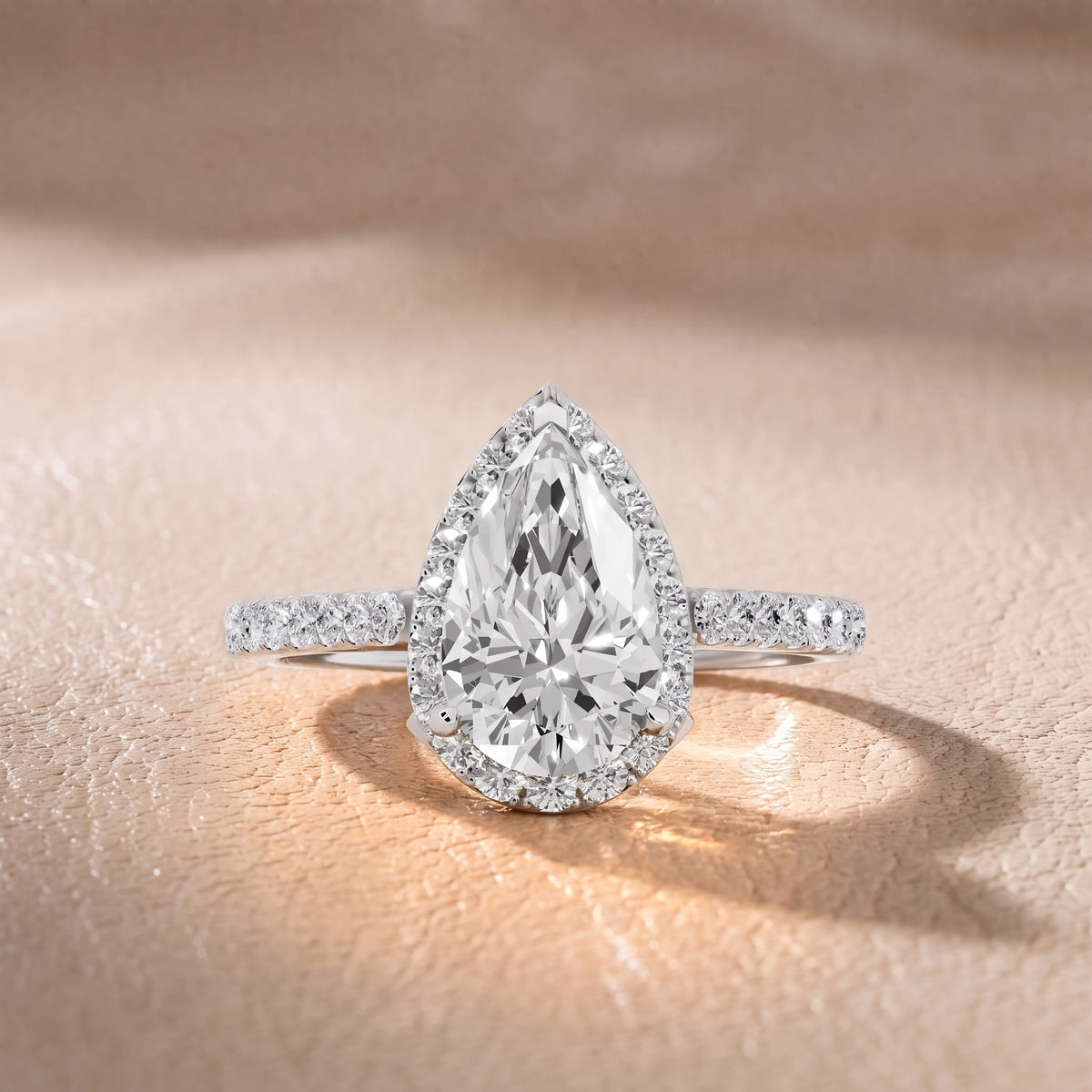 Alma Halo Pavé Pear Diamond Engagement Ring in White Gold - front.jpg