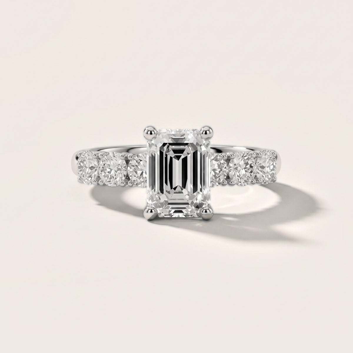 Sorrel Graduated Seven-Stone Emerald Diamond Engagement Ring in White Gold - front.jpg