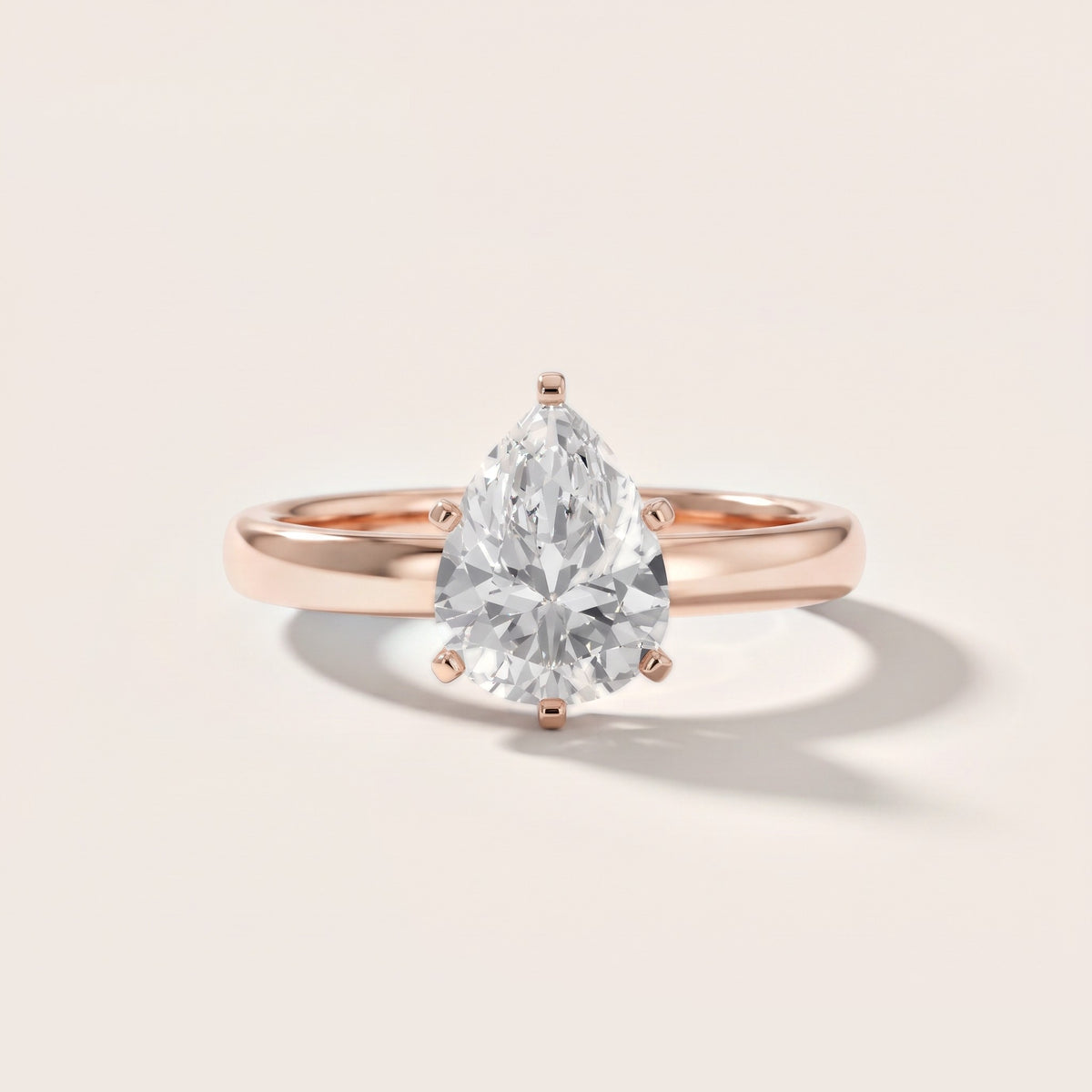 Elspeth Solitaire Pear Diamond Engagement Ring in Rose Gold - front.jpg