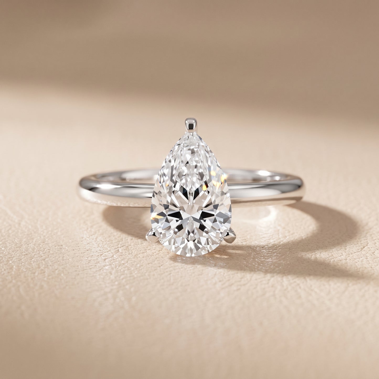 Wren Solitaire Pear Diamond Ring in White Gold - front.jpg