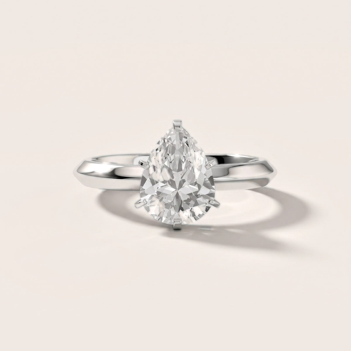 Hailey Solitaire Knife Edge Pear Diamond Engagement Ring in White Gold - front.jpg