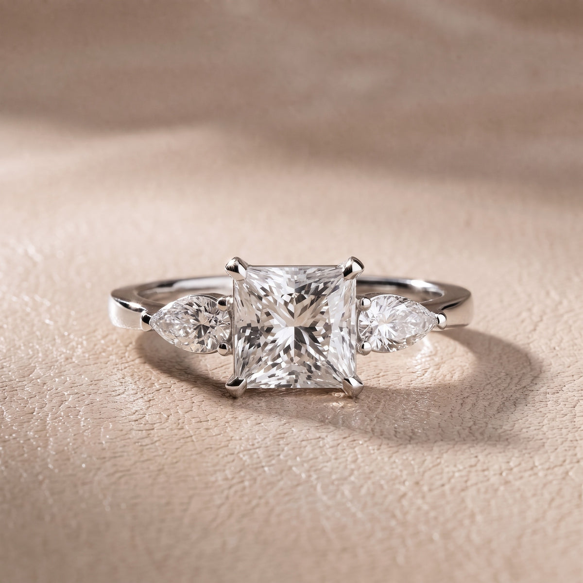 Grace Three Stone Princess Diamond Engagement Ring in Platinum - front.jpg