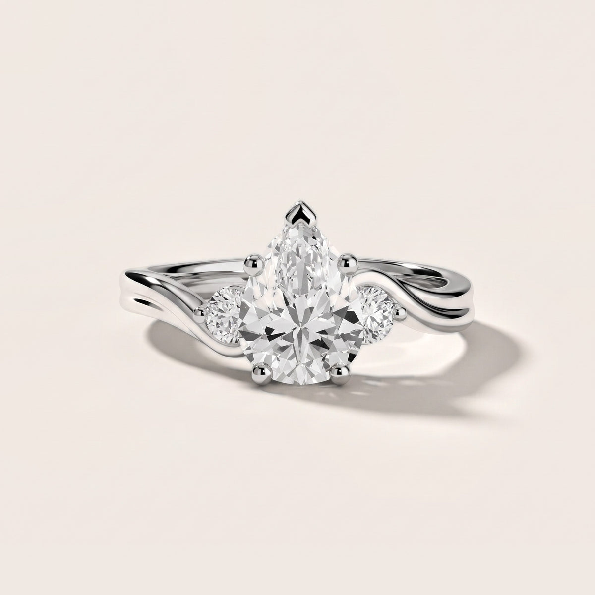 Rena Bypass Three-Stone Pear Diamond Engagement Ring in Silver - front.jpg