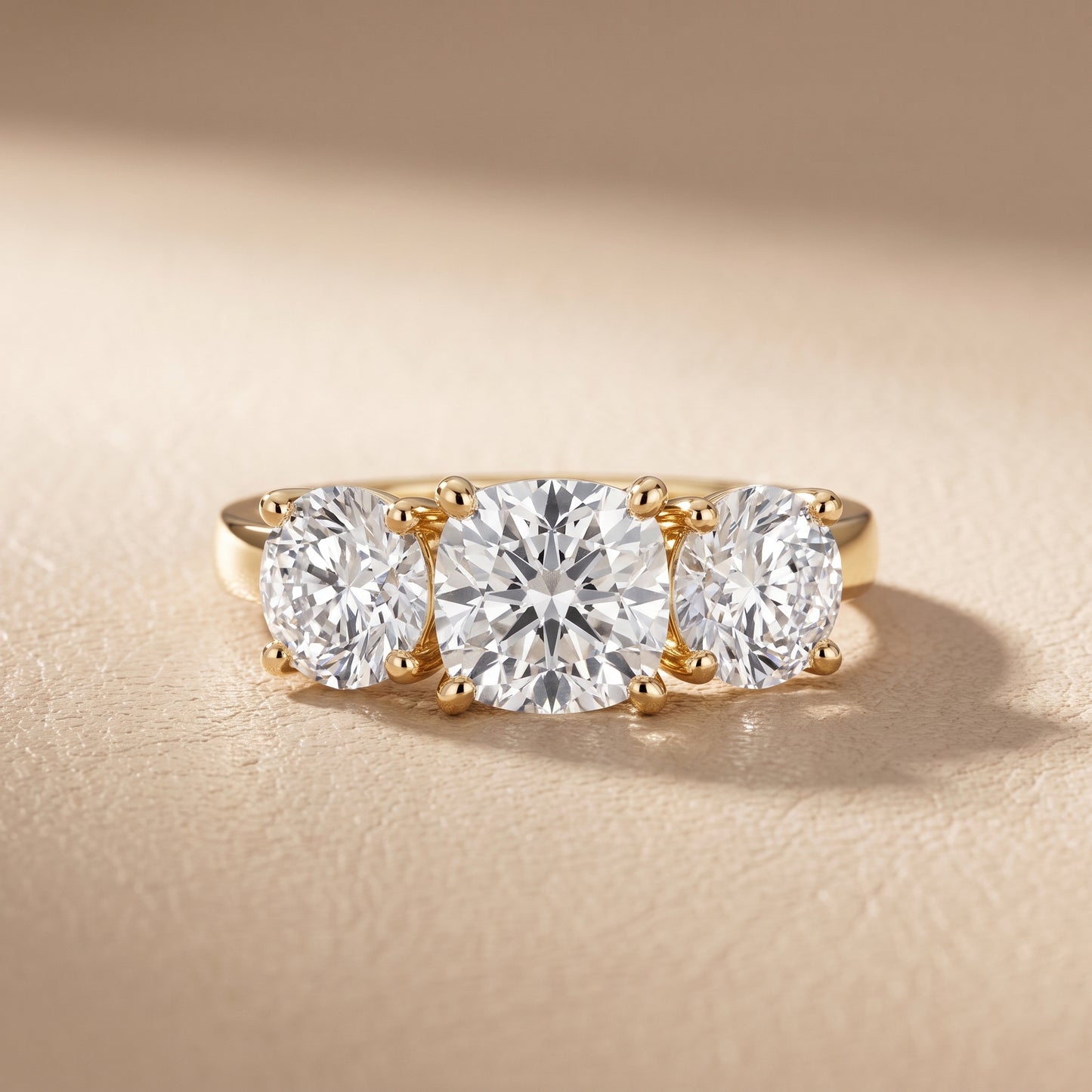 Esme Three-Stone Tapered Cushion Diamond Ring in Yellow Gold - front.jpg