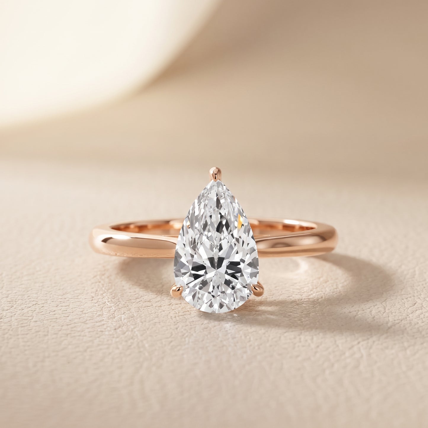 Kalia Knife Edge Solitaire Pear Diamond Engagement Ring in Rose Gold - front.jpg
