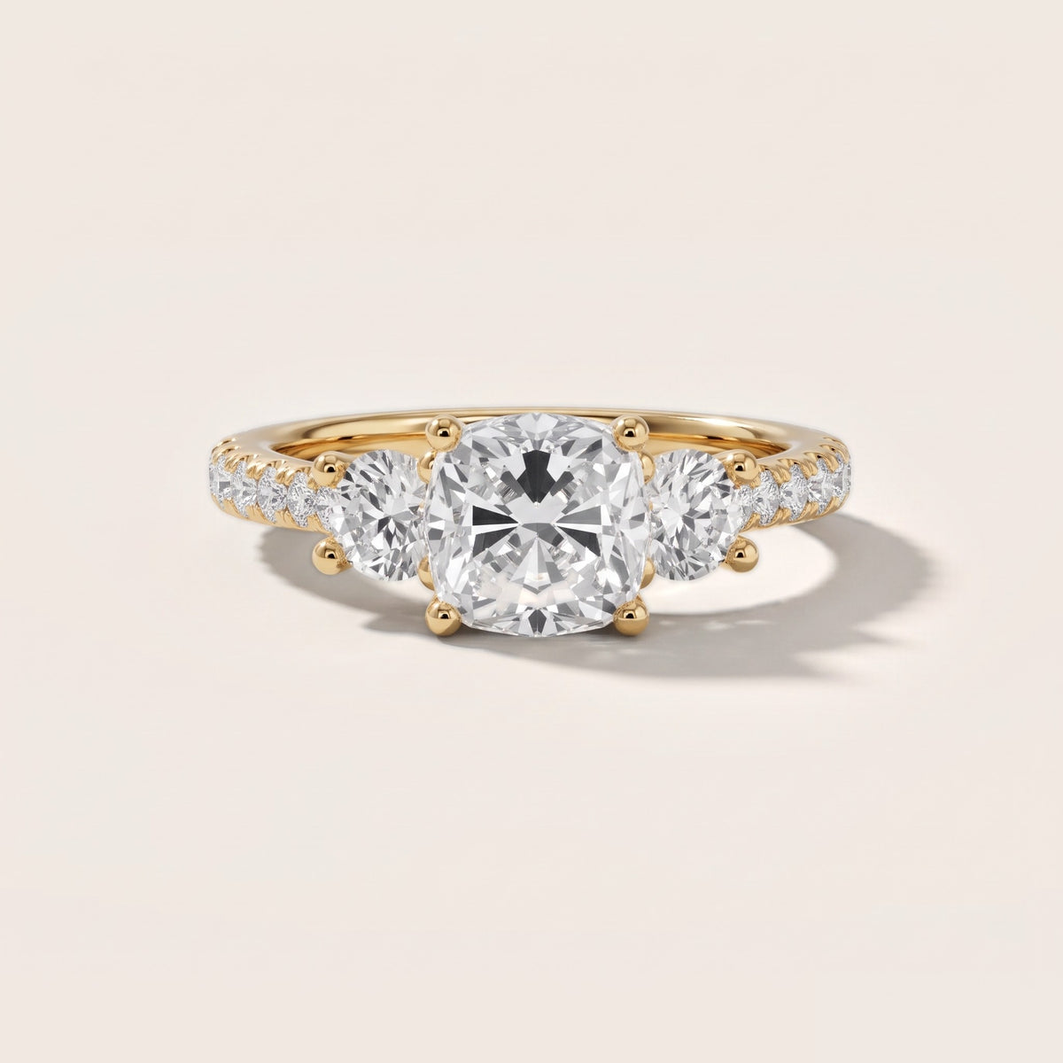 Sibyl Trellis Three-Stone Cushion Diamond Engagement Ring in Yellow Gold - front.jpg