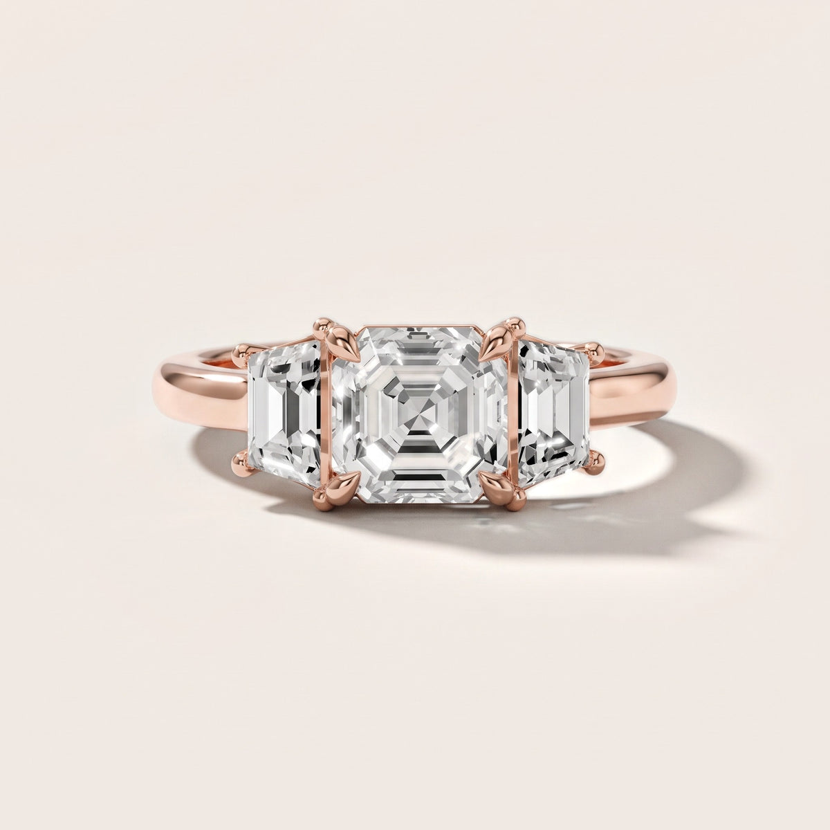 Filippa Trapezoid Three-Stone Asscher Diamond Engagement Ring in Rose Gold - front.jpg