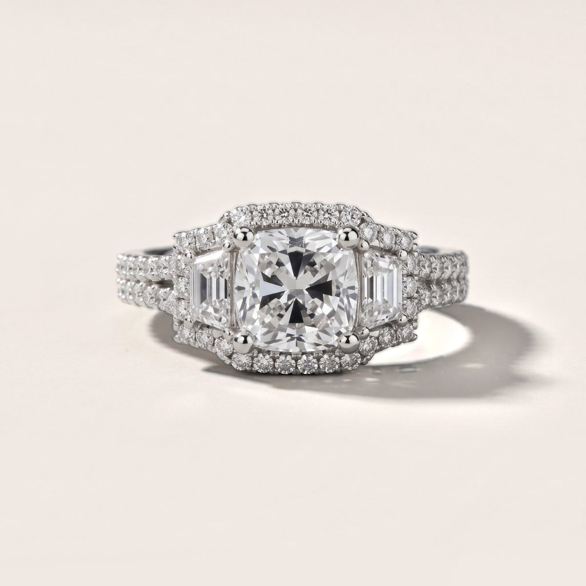Ronan Three-Stone Halo Cushion Diamond Engagement Ring in Silver - front.jpg