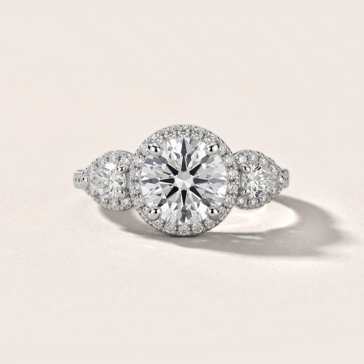 Camden Three-Stone Halo Round Diamond Engagement Ring in White Gold - front.jpg
