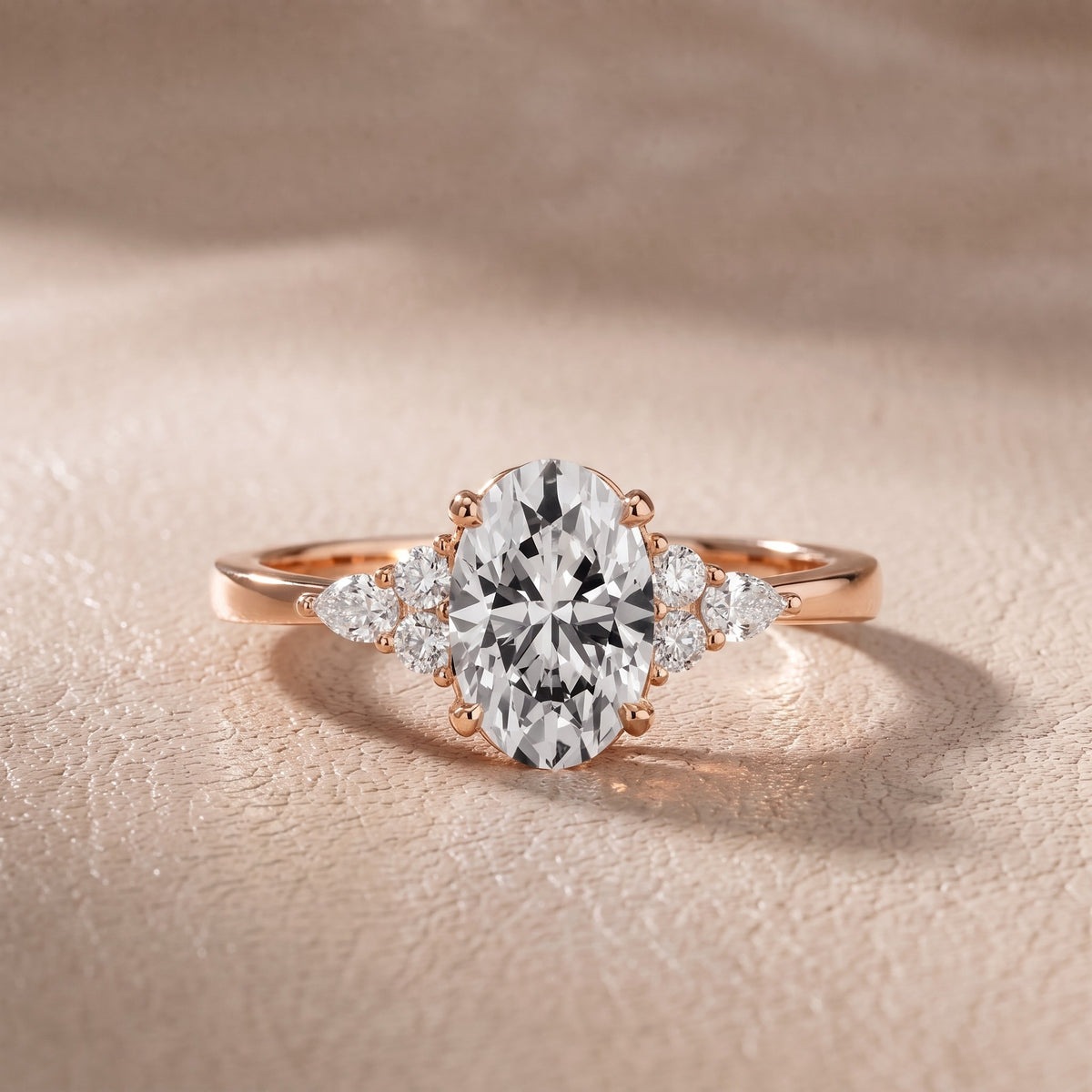 Amelia Three Stone Oval Diamond Engagement Ring in Rose Gold - front.jpg