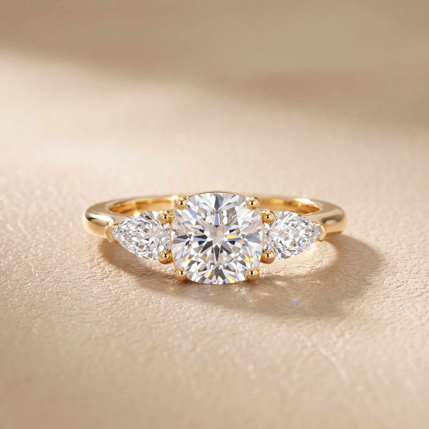 Mirabel Three-Stone Cushion Diamond Engagement Ring in Yellow Gold - front.jpg