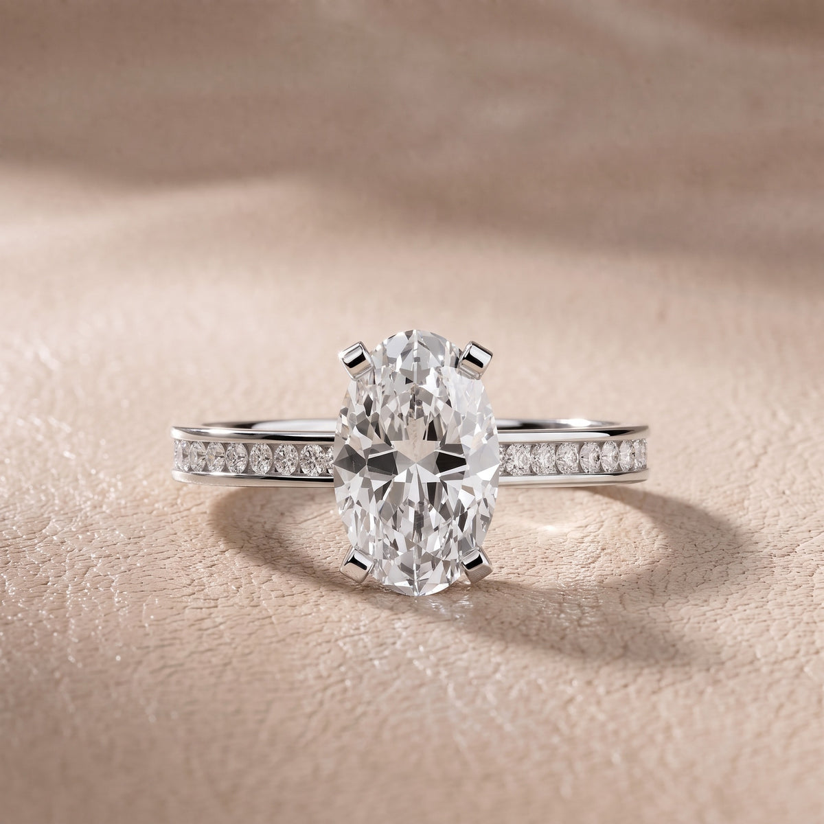Tessa Solitaire Channel Set Oval Diamond Engagement Ring in Platinum - front.jpg