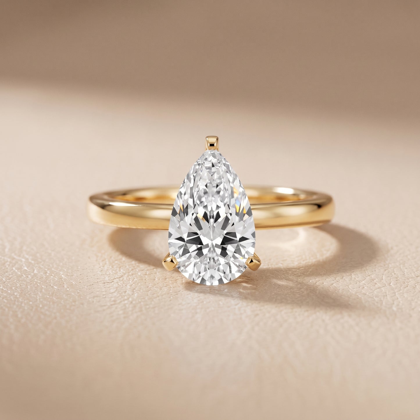 Liana Solitaire Claw Prong Pear Diamond Engagement Ring in Yellow Gold - front.jpg
