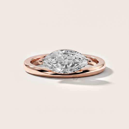 Maisie Four Prong Solitaire Marquise Diamond Engagement Ring in Rose Gold
