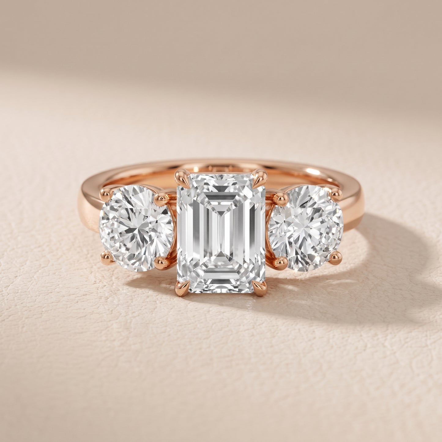Esme Three-Stone Tapered Emerald Diamond Ring in Rose Gold - front.jpg