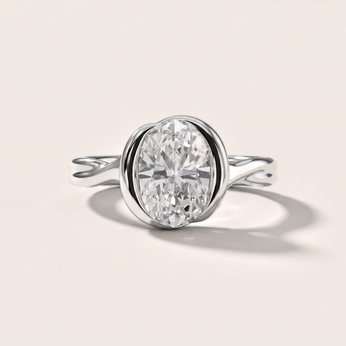 Lucille Half Bezel Solitaire Oval Diamond Engagement Ring in Silver - front.jpg