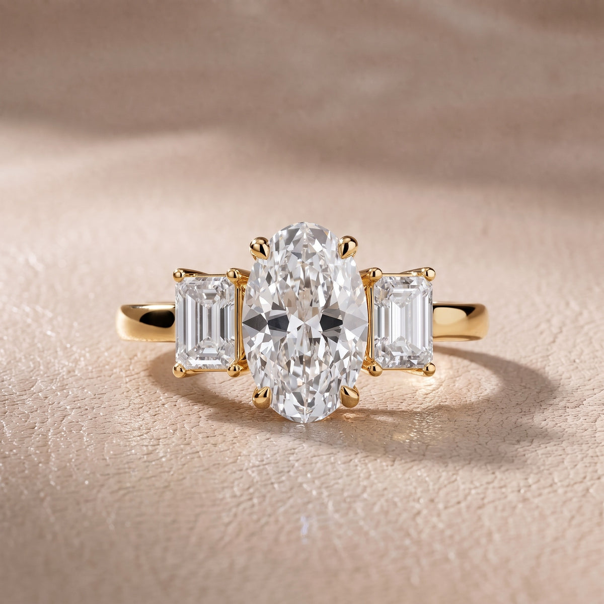 Zoe Three-Stone Oval Diamond Engagement Ring in Yellow Gold - front.jpg